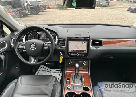 2013 Volkswagen Touareg V6 Tdi z USA, uszkodzony, nr VIN WVGEP9BP8DD005795